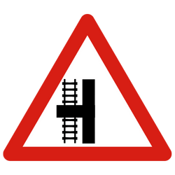 Tram Or Railway Crossing To The Left